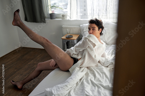 Tableau sur toile Transgender has fun in the bedroom, full length photo