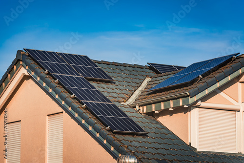 Photovoltaic panels on the roof of family house, solar panels.