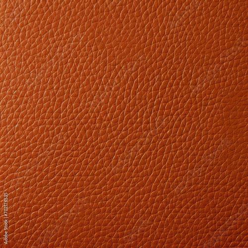 Brown leather texture close-up, pebbled surface detail, luxury material background, full frame, square format.