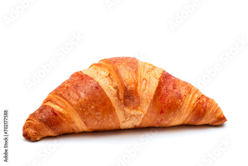 Crispy croissant on a white background close-up. Homemade baking