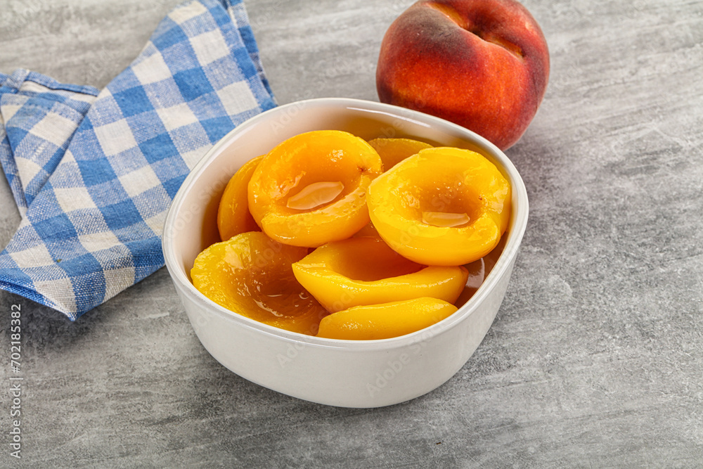 Ripe sweet and juicy canned peach Ripe sweet and juicy canned peach