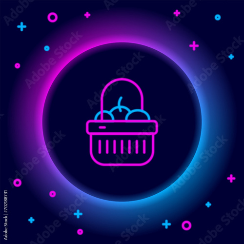 Glowing neon line Shopping basket and food icon isolated on black background. Food store, supermarket. Colorful outline concept. Vector