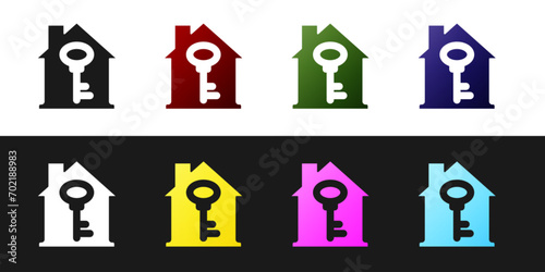Set House with key icon isolated on black and white background. The concept of the house turnkey.  Vector
