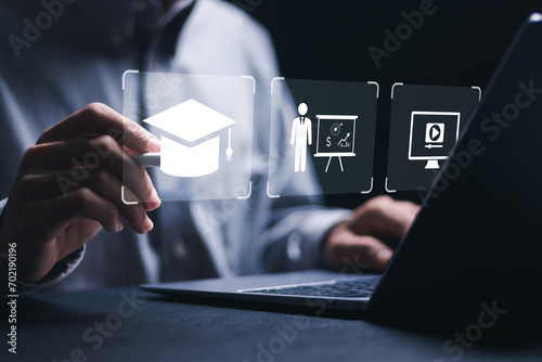 Online education concept. businessman use laptop to Online education training and e-learning webinar on internet. Education internet technology. photo