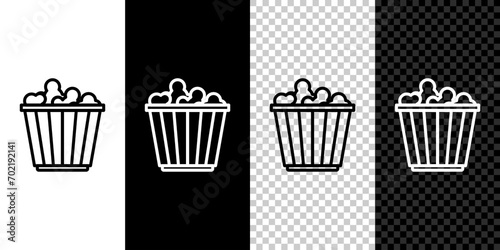 Set line Popcorn in cardboard box icon isolated on black and white background. Popcorn bucket box.  Vector