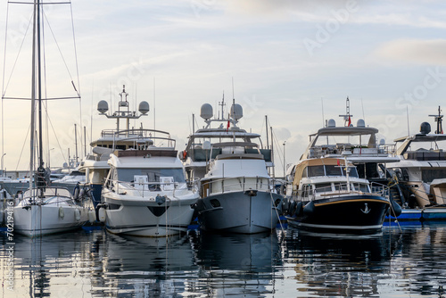 Yachts moored in marina. Mediterranean yacht port with sailing boats. Yachting concept.