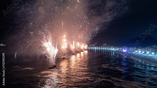 aerial image  made with a drone  of the fireworks display at Copacabana Beach  in Rio de Janeiro  Brazil  at the turn of the year