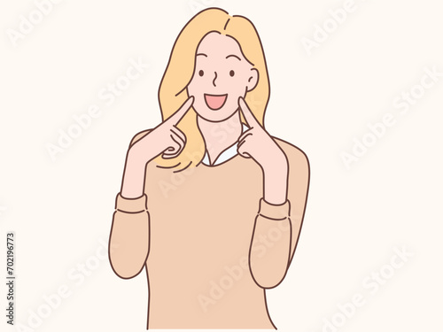 young woman pointing finger to her teeth on isolated pink background. Facial and skin care concept for commercial advertising vector illustration.