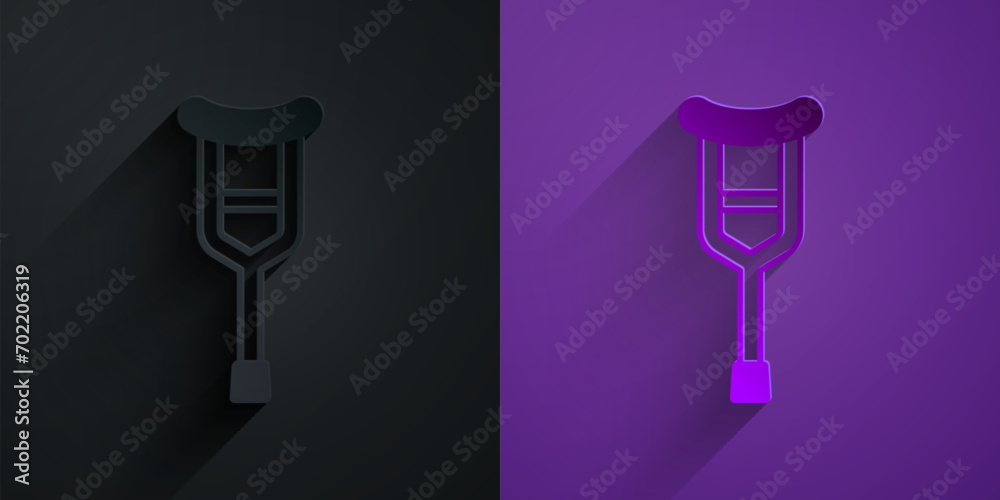 Paper cut Crutch or crutches icon isolated on black on purple background. Equipment for rehabilitation of people with diseases of musculoskeletal system. Paper art style. Vector Paper cut Crutch or crutches icon isolated on black on purple background. Equipment for rehabilitation of people with diseases of musculoskeletal system. Paper art style. Vector