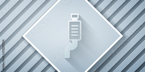 Paper cut Car muffler icon isolated on grey background. Exhaust pipe. Paper art style. Vector