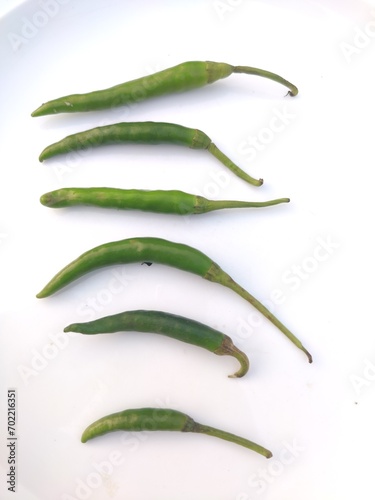 Green chillies are shown as a sample with white backgrounds giving a great view.