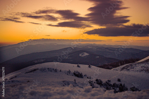 View from Buzludzha, Bulgaria - Mart 2023, Beautiful sunset, on Buzludzha Peak photo