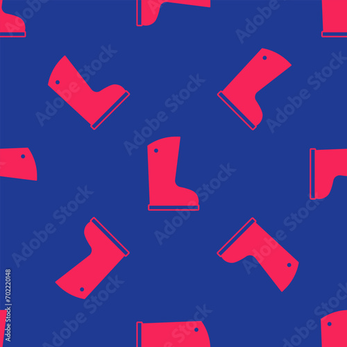 Red Waterproof rubber boot icon isolated seamless pattern on blue background. Gumboots for rainy weather, fishing, gardening.  Vector