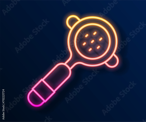 Glowing neon line Coffee filter holder icon isolated on black background.  Vector
