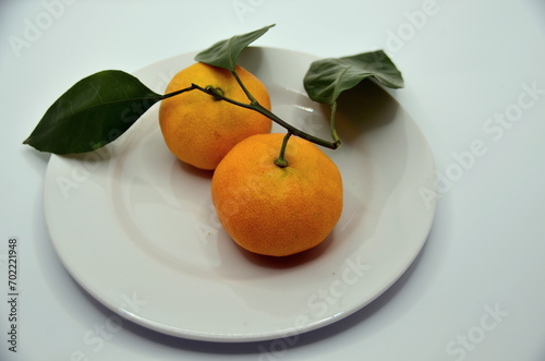 tangerines on a plate