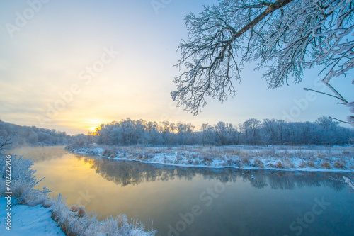 Experience the magic of a winter wonderland. Watch the sun rise over the frozen river. Be captivated by beauty and whimsy.