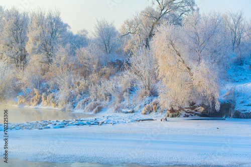 Enjoy the breathtaking beauty of the frozen river at sunrise. Witness nature's mesmerizing canvas of shimmering frost. Immerse yourself in the splendor of icy beauty. The splendor of the sunrise.