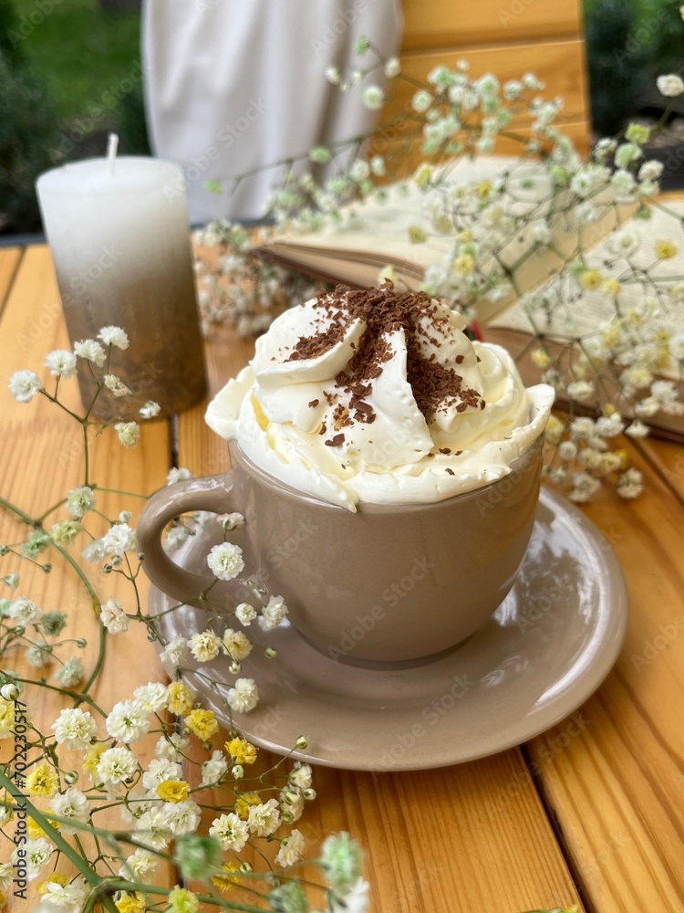 Coffee with cream and sprinkles Coffee with cream and sprinkles
