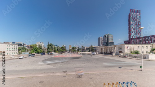 Panorama showing traffic on the Deshmoret e Kombit Boulevard in Tirana timelapse. photo