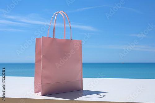 Pink shopping bag on blue sky  minimal style springtime or summer sale and Valentine surprise offer promotion concept.