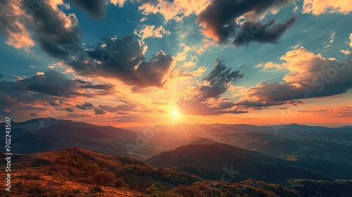 Sunset Casting a Golden Glow Over Majestic Mountain Range