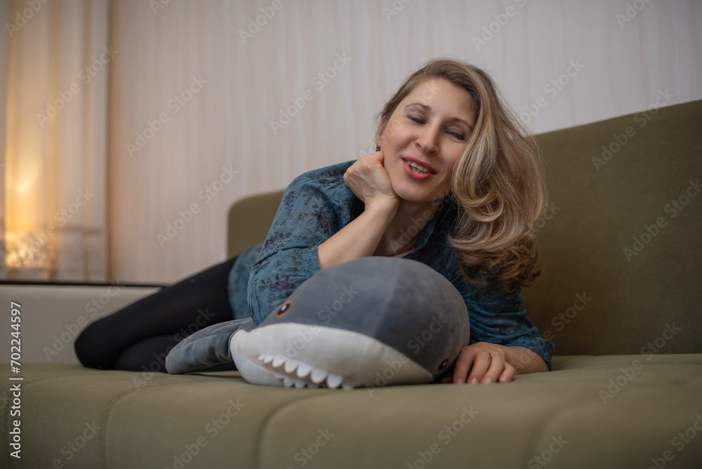 Portrait of a young beautiful blonde girl at home.. Portrait of a young beautiful blonde girl at home..