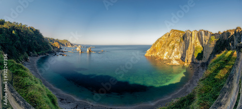 Playa del Silencio, has imposing quartzite cliffs, Cudillero Asturias, Spain photo