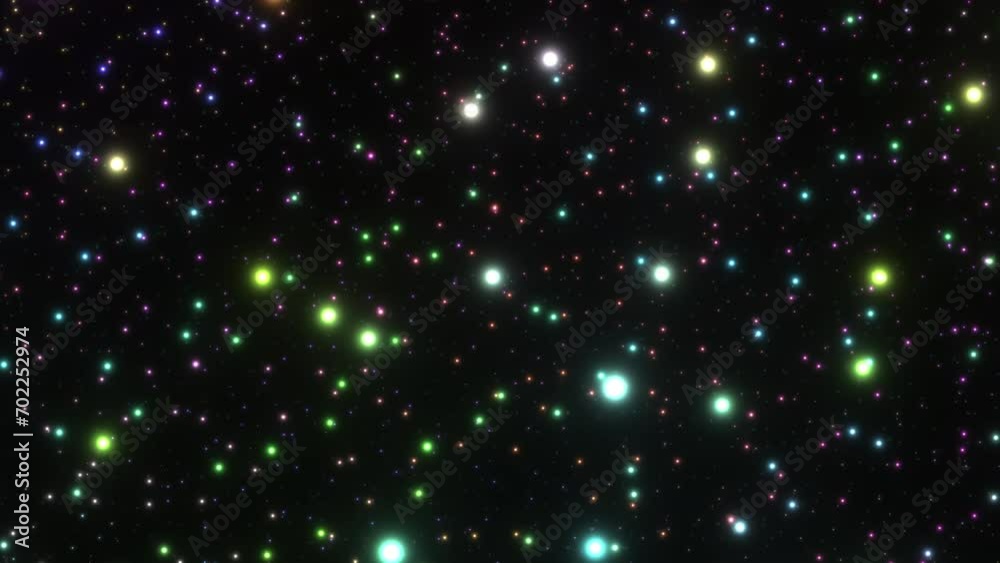 Colored dots flying in on a black background Colored dots flying in on a black background