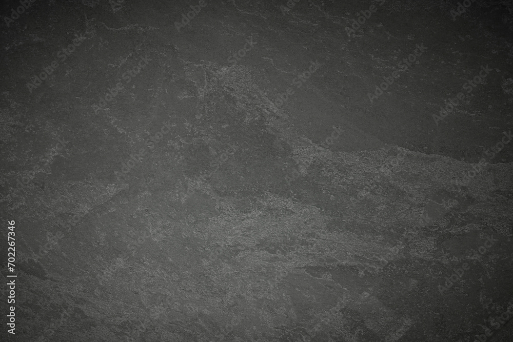 Naklejka premium black stone wall background. dark grey texture. dark black stone background.