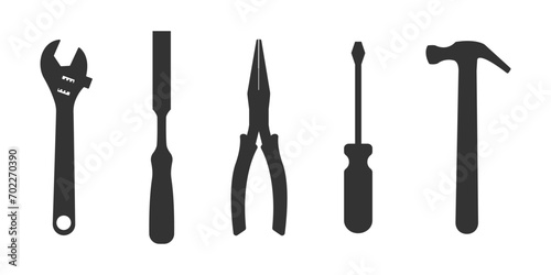 Set of different handyman tools. Adjustable wrench, chisel, pliers, screwdriver, hammer silhouettes isolated on white background. Toolkit of carpenter, repairman, builder, master. Vector illustration
