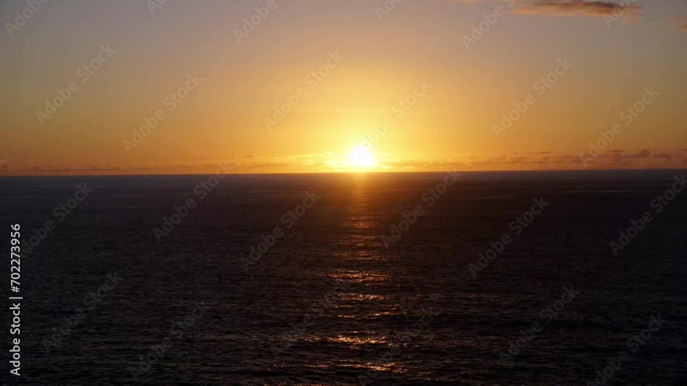 Sun rising over the sea at dawn Sun rising over the sea at dawn