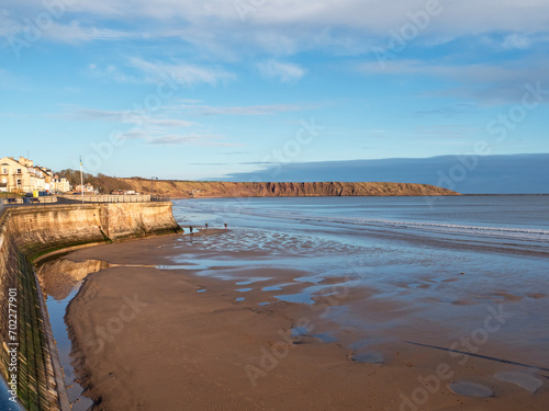 View over Filey beach to Filey Brigg, North Yorkshire, England