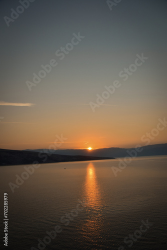 sunrise over the sea, clear sky without clouds. golden hour.   © doda