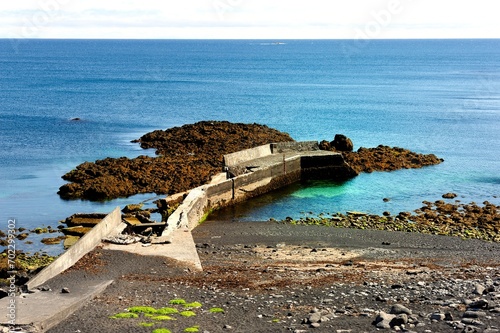 old pier in the sea photo