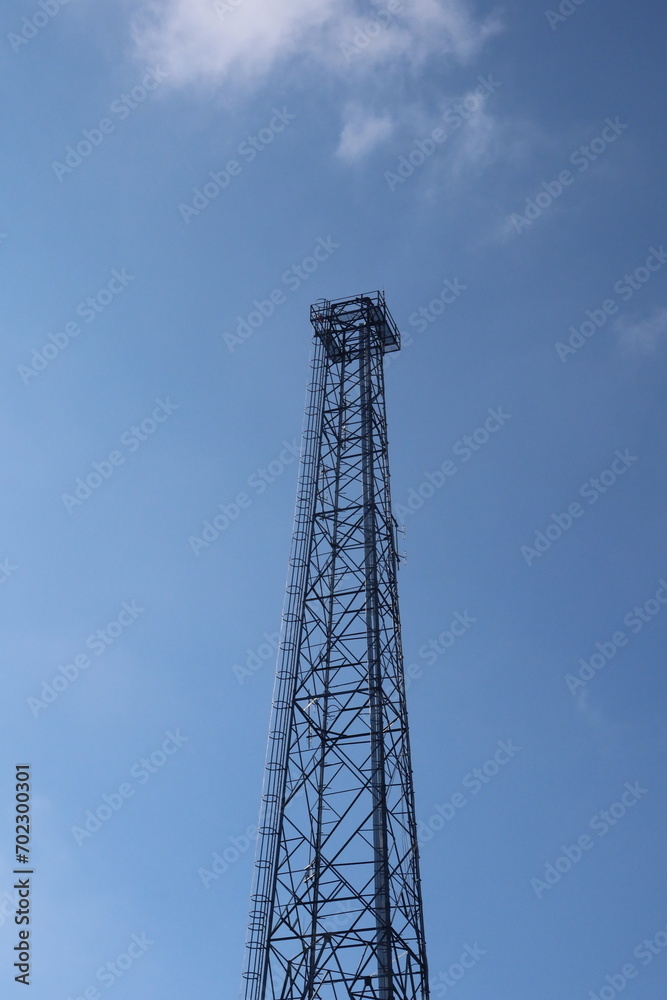 telecommunication tower cable in the Peak, Hong Kong in a good weather blue sky telecommunication tower cable in the Peak, Hong Kong in a good weather blue sky