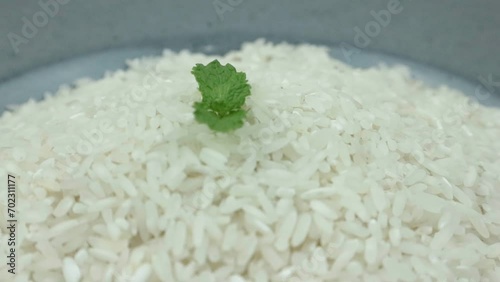 top view of white rice on rotary display. photo
