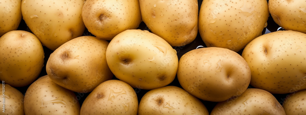 close up of potatoes in water drops