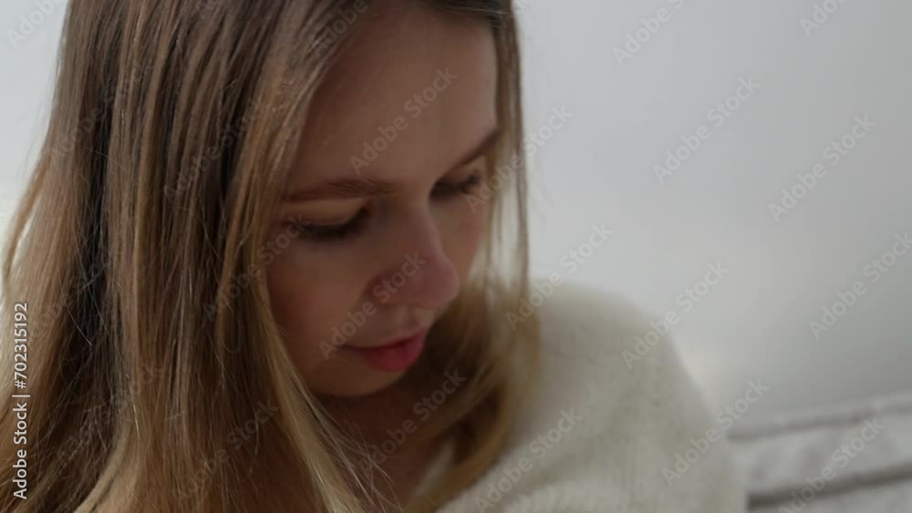 a young mother holds a baby in her arms and breastfeeds. breastfeeding.