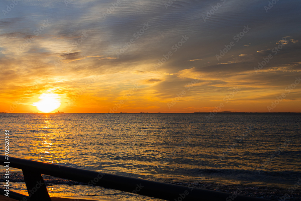 It is one of the beauties of nature that the clouds turn colorful at the seaside, during the sunrise.