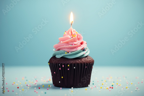 cupcake chocolate with festive, burning candle, sprinkling, isolated, background