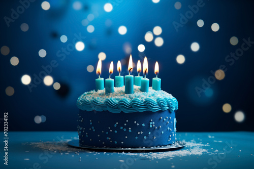 cake festive blue with seven burning candles on simple background cake festive green with burning candles on simple background