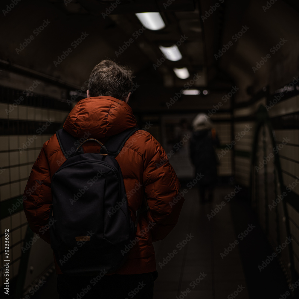 Embark on a subterranean stroll through London's bustling subway, where urban explorations unfold in a dynamic tapestry. This photograph captures the essence of city life beneath the surface