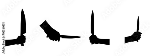 Hand holding knife  isolated on white background. Shadow of killing knife in hand