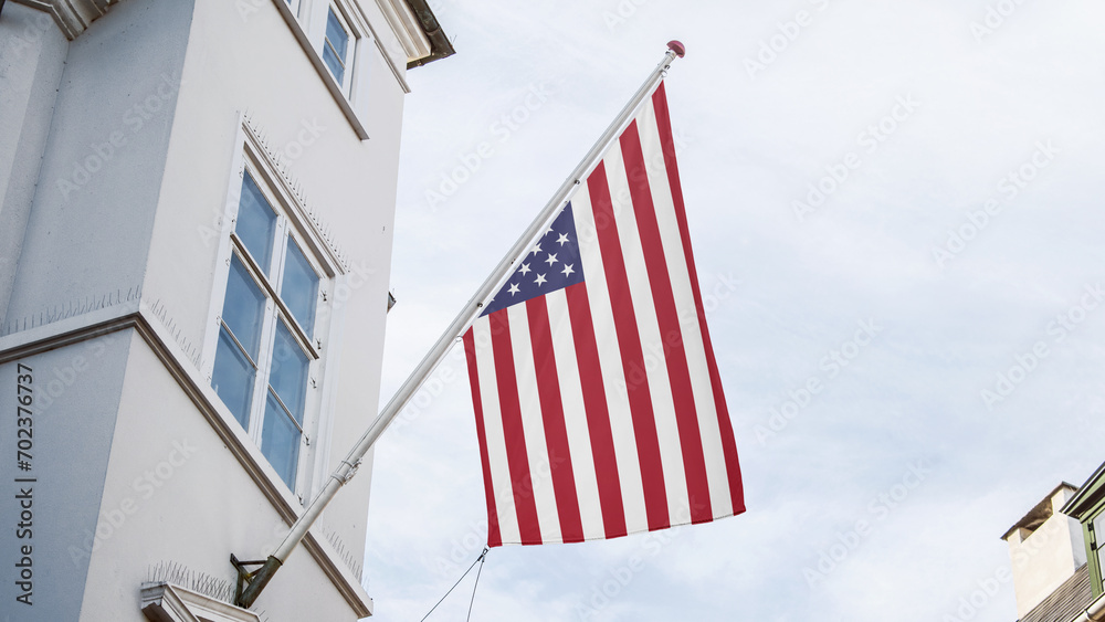 USA flag in front of building