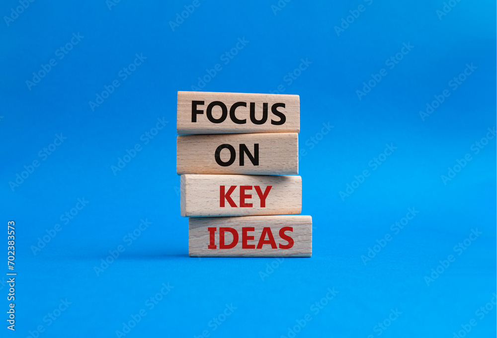 Focus on Key Ideas symbol. Concept words Focus on Key Ideas on wooden blocks. Beautiful blue background. Business and Focus on Key Ideas concept. Copy space Focus on Key Ideas symbol. Concept words Focus on Key Ideas on wooden blocks. Beautiful blue background. Business and Focus on Key Ideas concept. Copy space