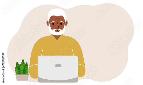 A man is working or studying at a laptop. Freelancing or distance learning and work concept.