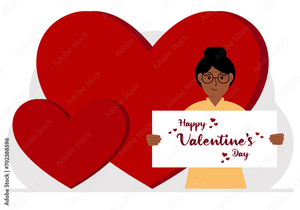 A woman holds a Happy Valentine's Day greeting against a background of red hearts. A woman holds a Happy Valentine's Day greeting against a background of red hearts.
