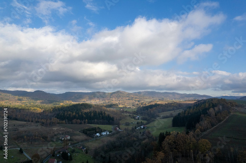 Fototapeta Naklejka Na Ścianę i Meble -  Southern Poland landscape, mountains, autumn, day, sun, sky, clouds, Klodzka Basin, dramatic and majestic scenery