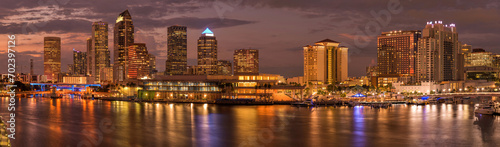 Tampa at Dusk - A panoramic dusk view of waterfront skyline of Tampa Downtown on a calm Summer evening. Florida, USA.