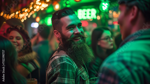 A bearded man smiling and toasting in a traditional Irish pub at St. Patrick's day. 